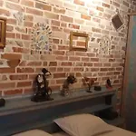 Arti Ксамил